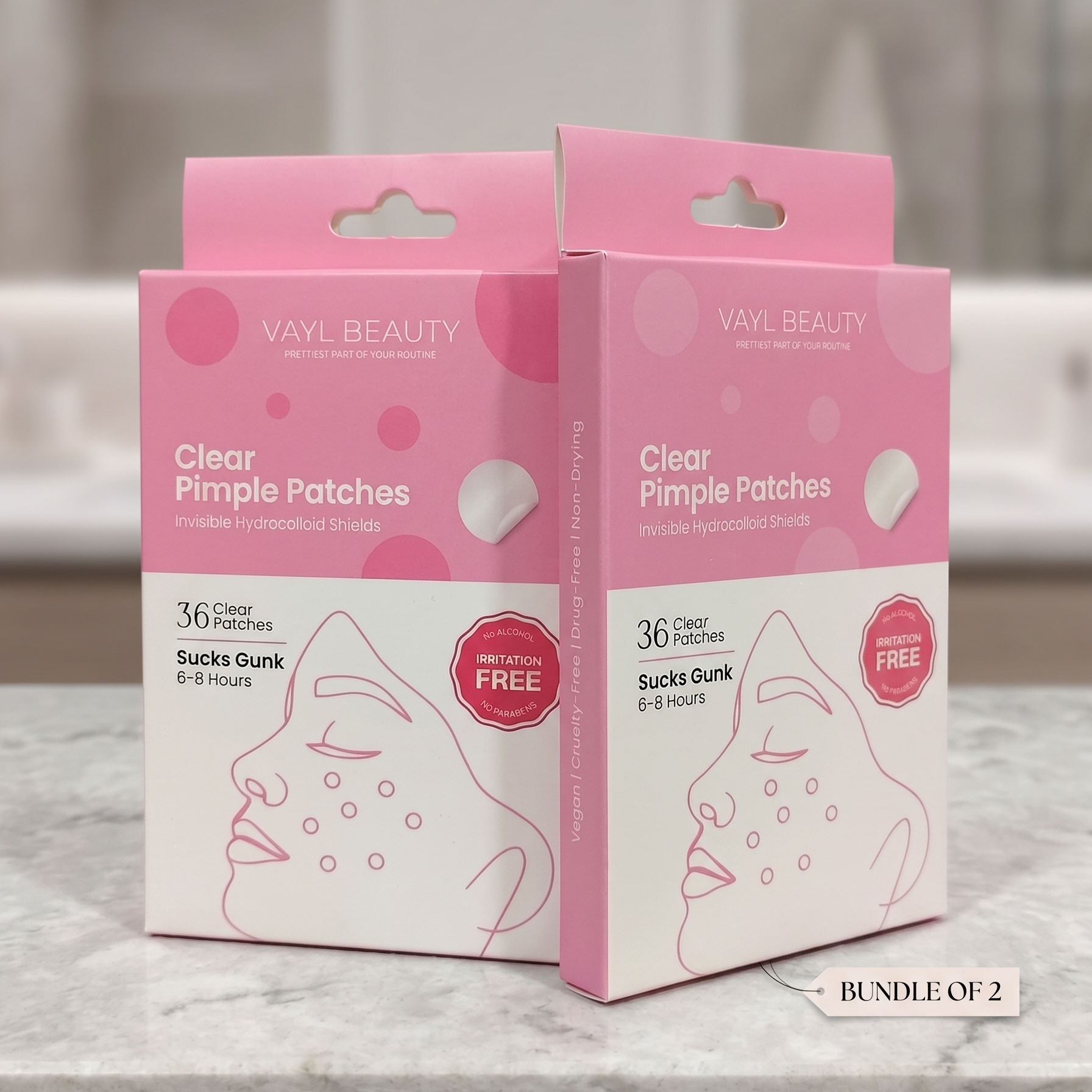 Two boxes of VAYL Beauty Clear Pimple Patches on a marble surface. Bundle of 2, hydrocolloid acne patch Pakistan.